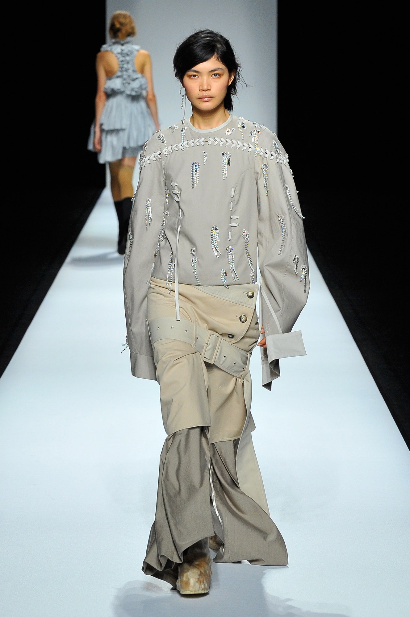 gray relaxed top with beige pants