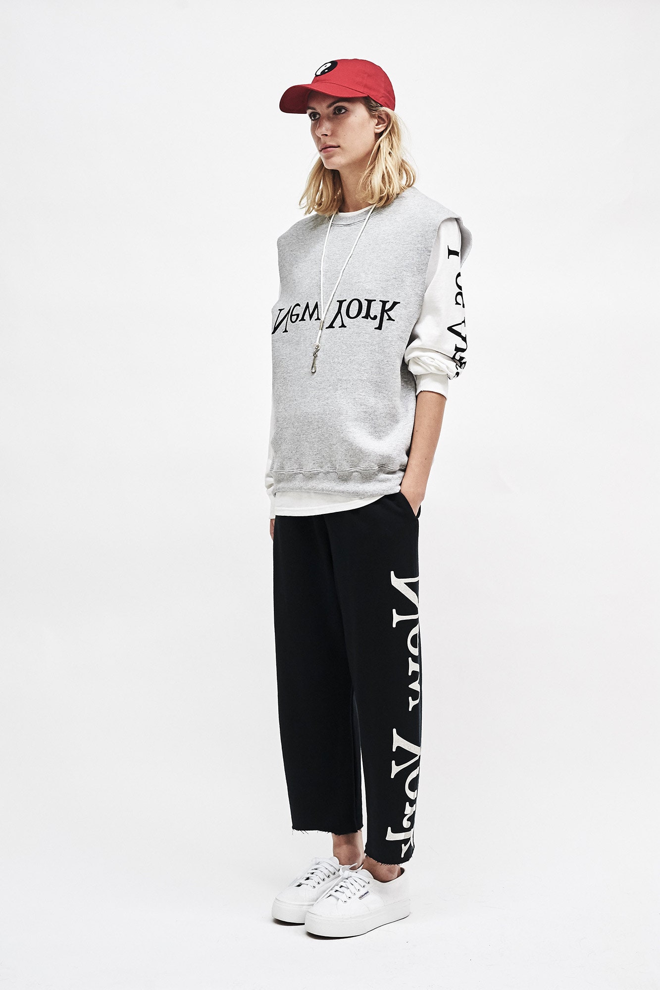 gray relaxed sweater with black pants