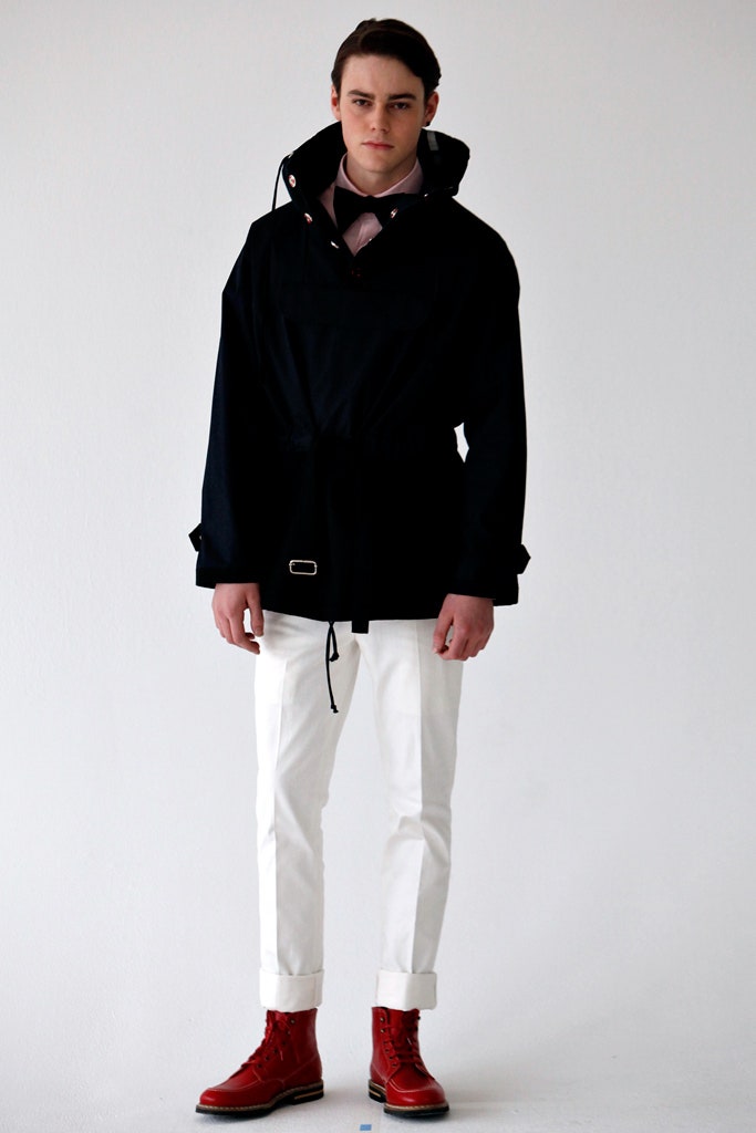 black relaxed jacket with white pants