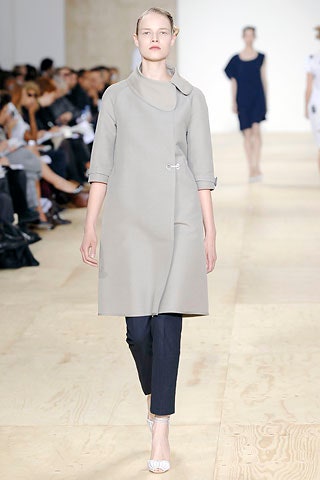 gray fitted coat with navy pants