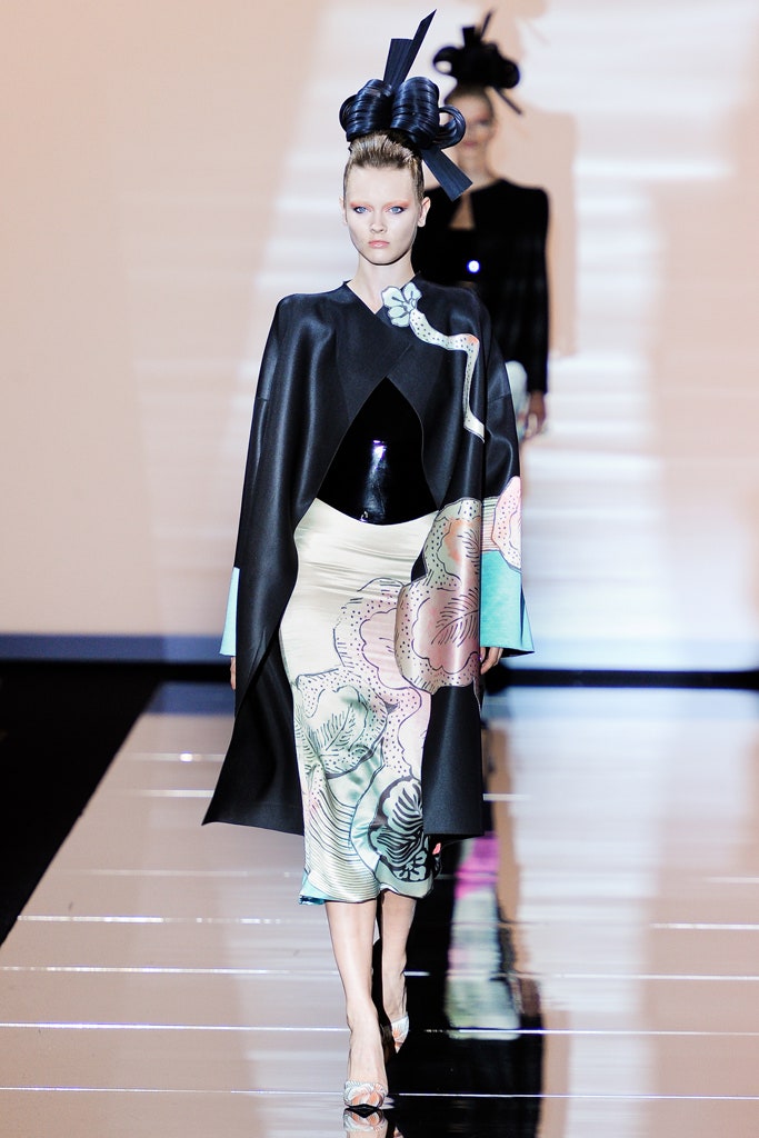 black silk cape and cream midi dress