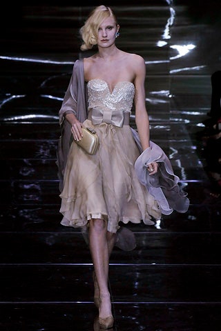 beige silk strapless fitted a-line ruffled flowing dress