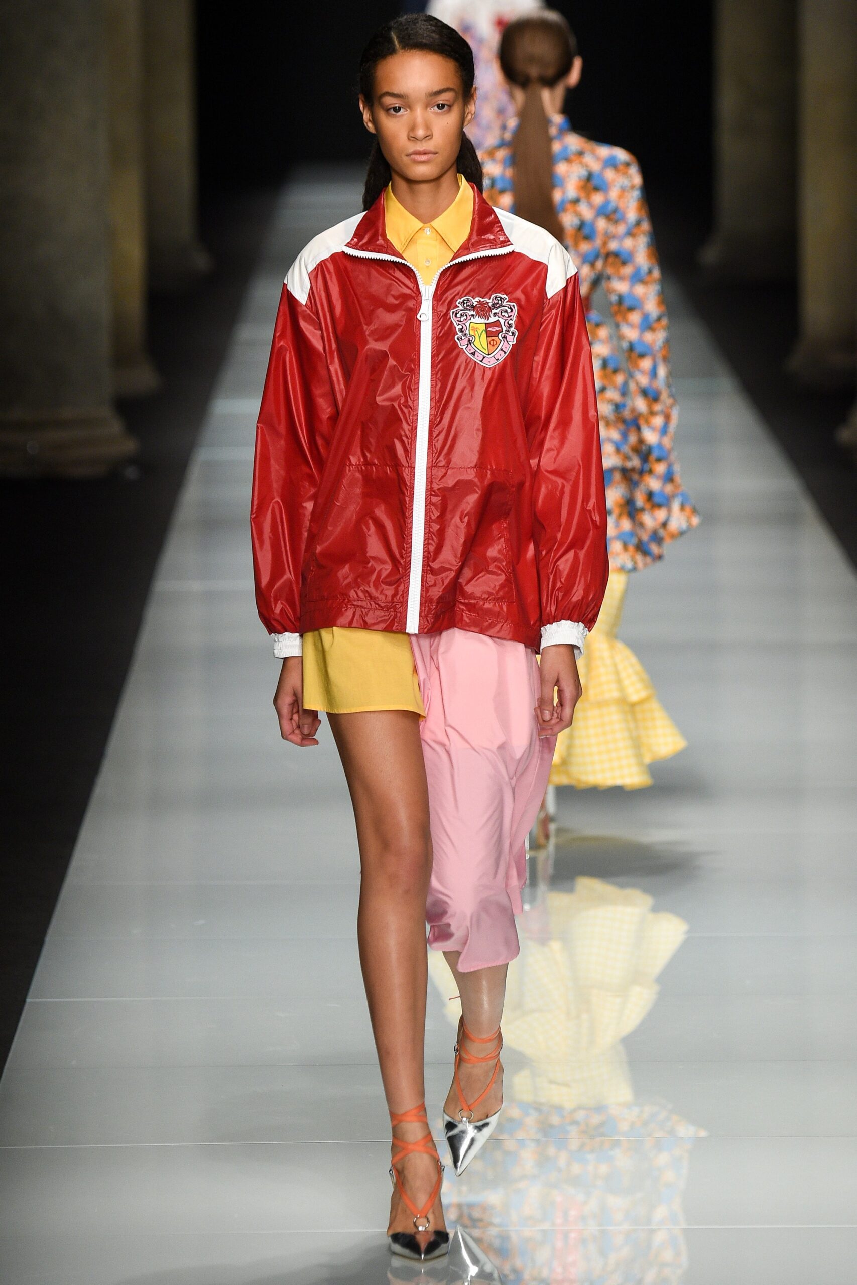 red vinyl jacket with yellow dress