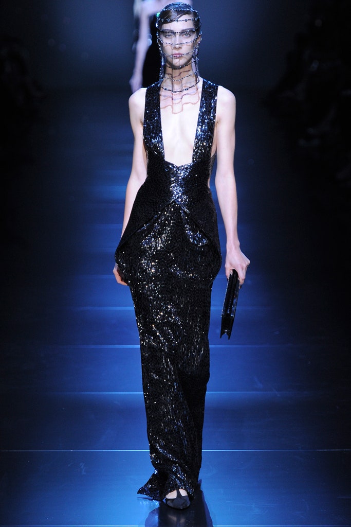 black sequin sleeveless v-neck fitted draped shiny gown