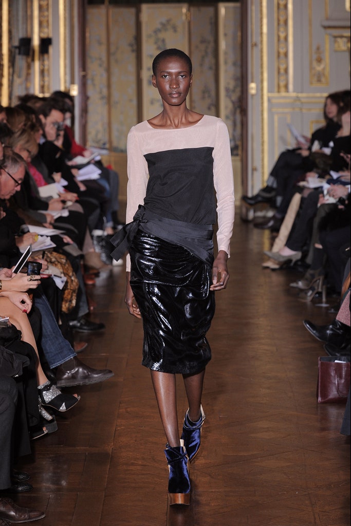 black and beige layered top with vinyl skirt