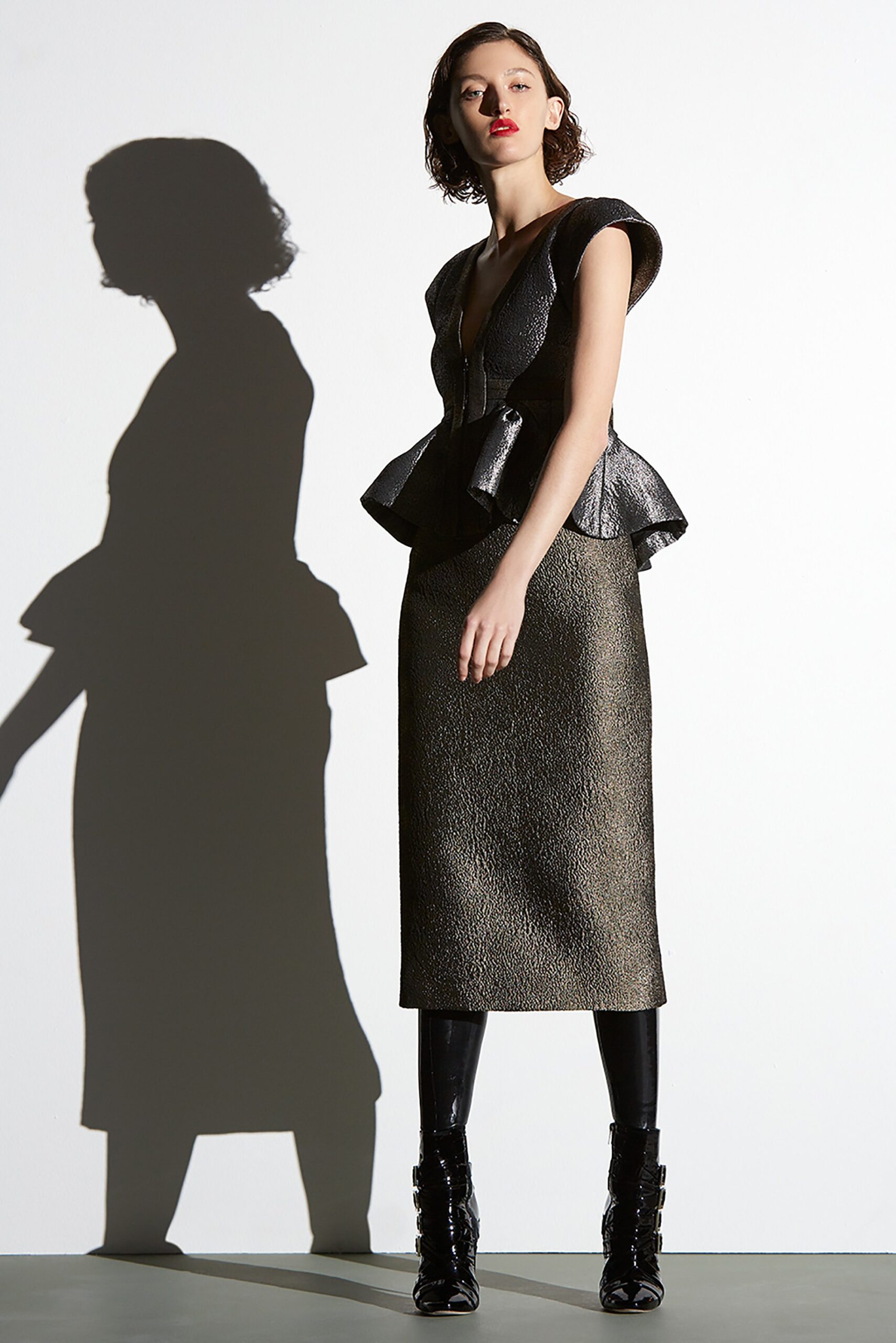black silk sleeveless v-neck fitted flared dress