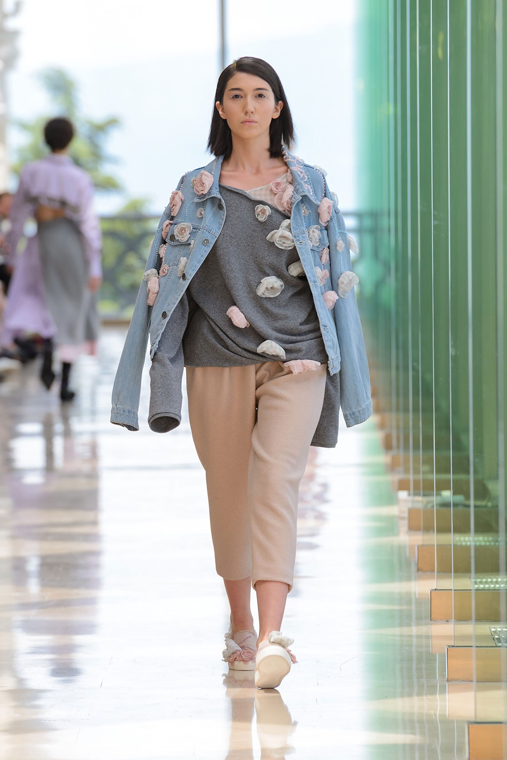 blue denim jacket with gray top