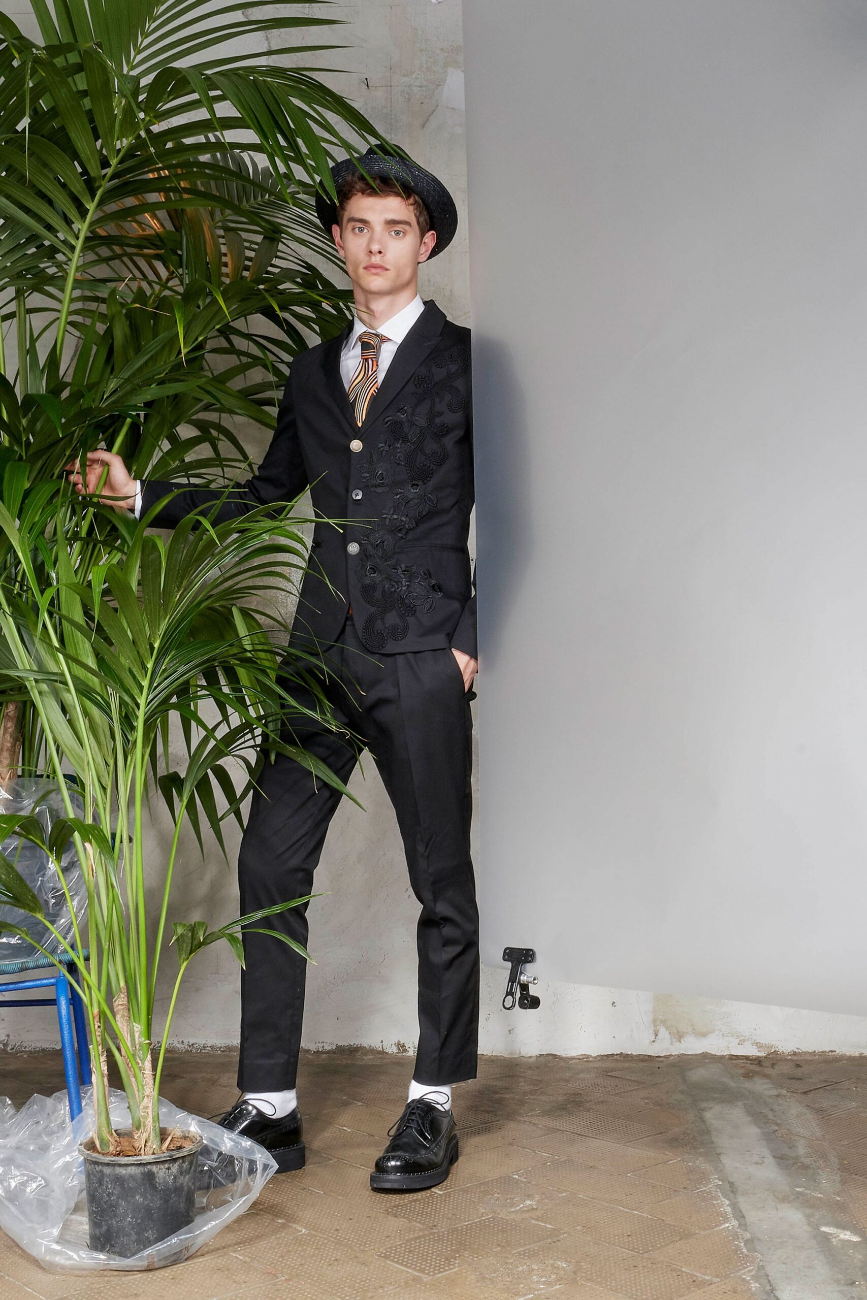 black tailored suit with hat