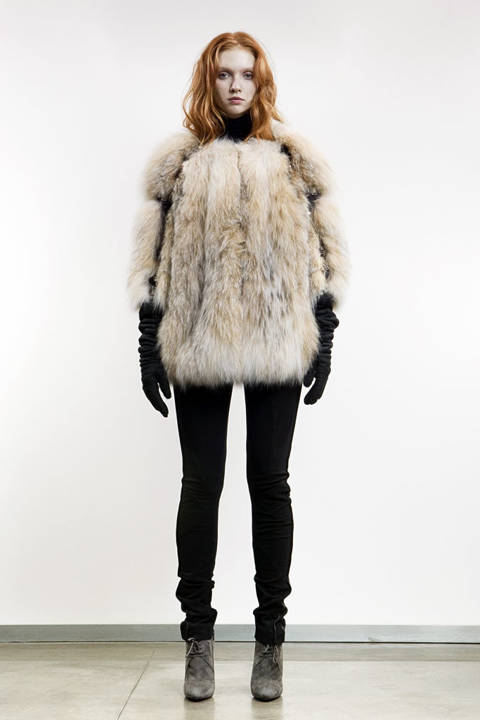 beige fur coat with black pants