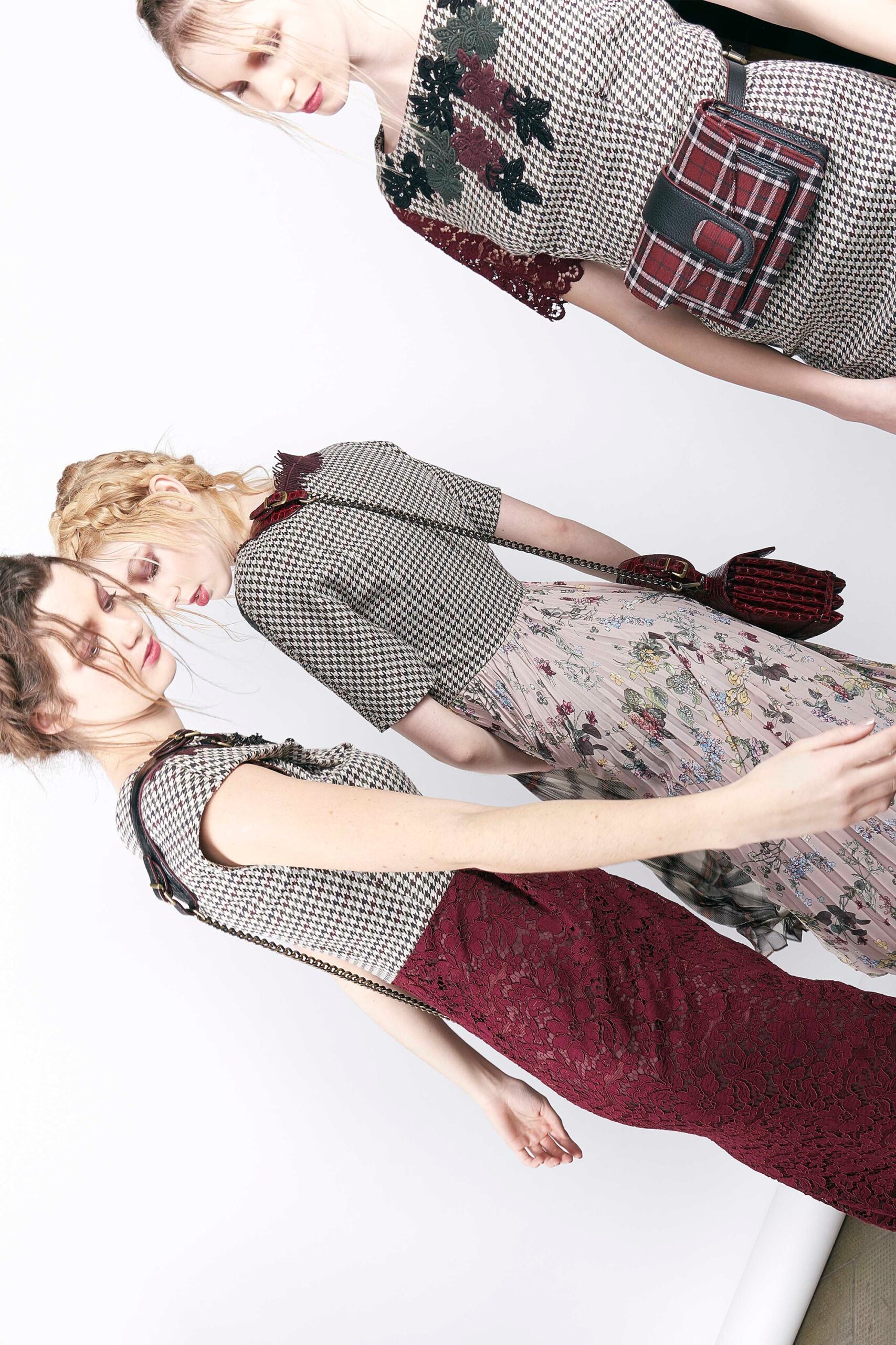 black lace midi dress and beige chiffon dress