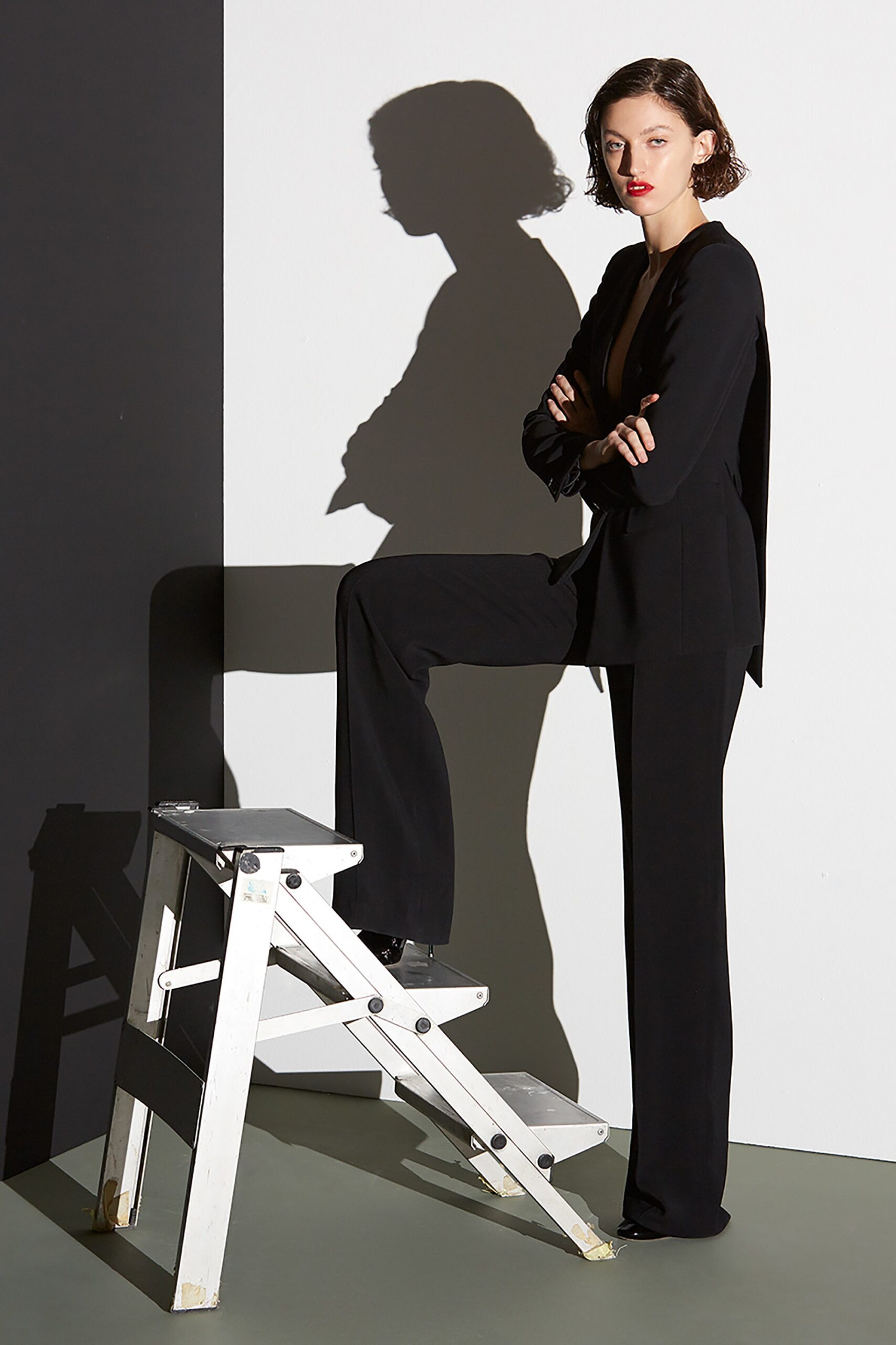 black silk long-sleeve collared fitted structured suit