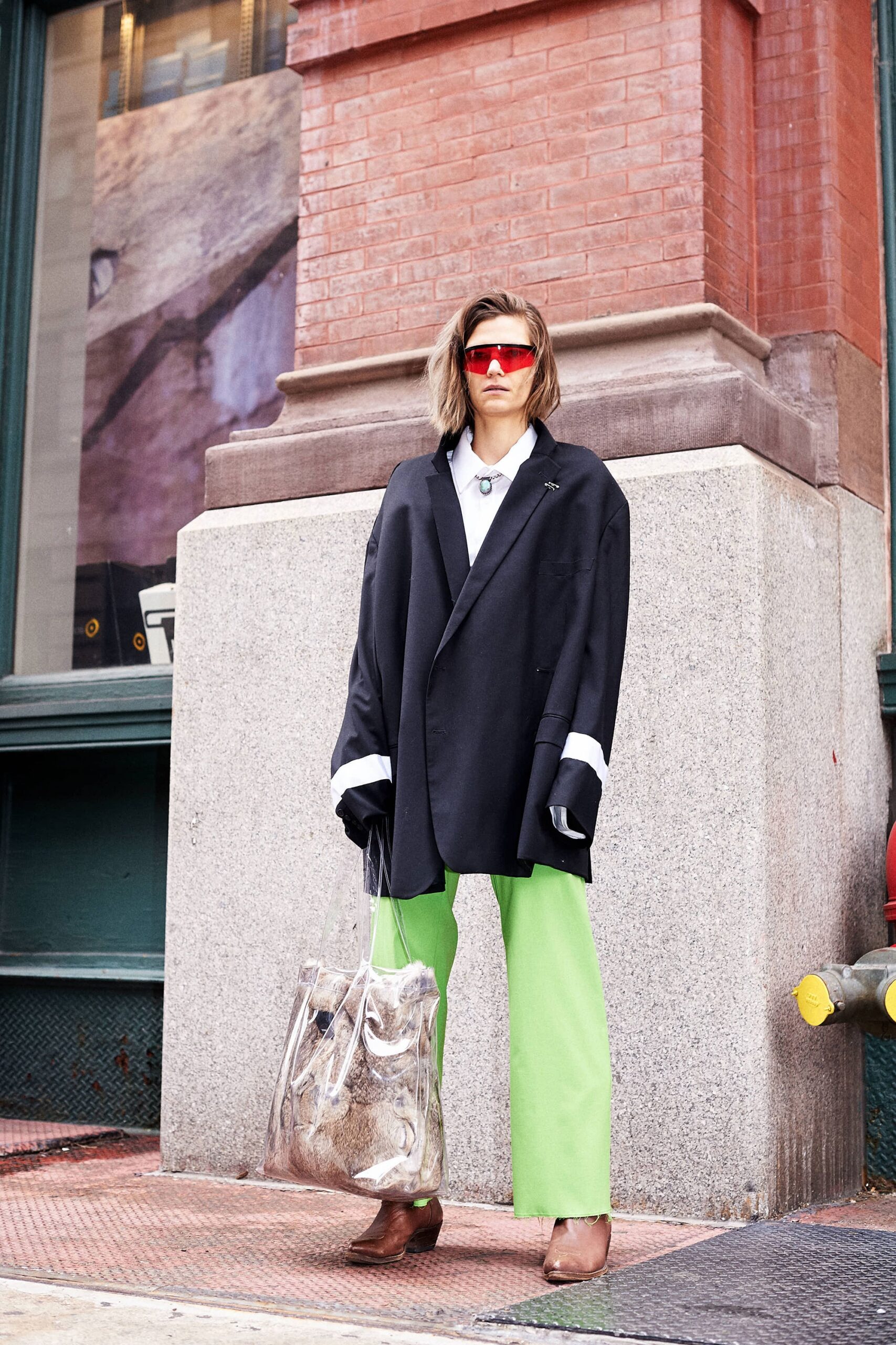 oversized black blazer with green pants