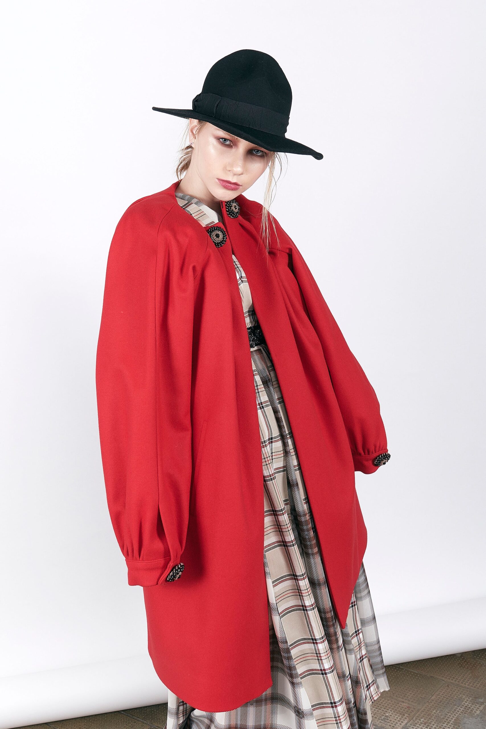 red wool coat with beige dress