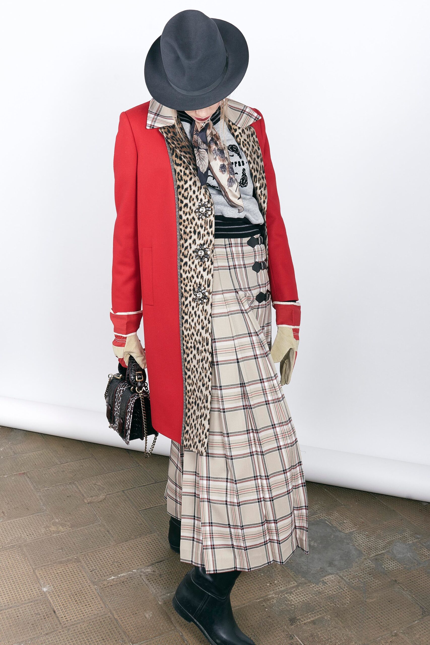 red wool coat with pleated skirt