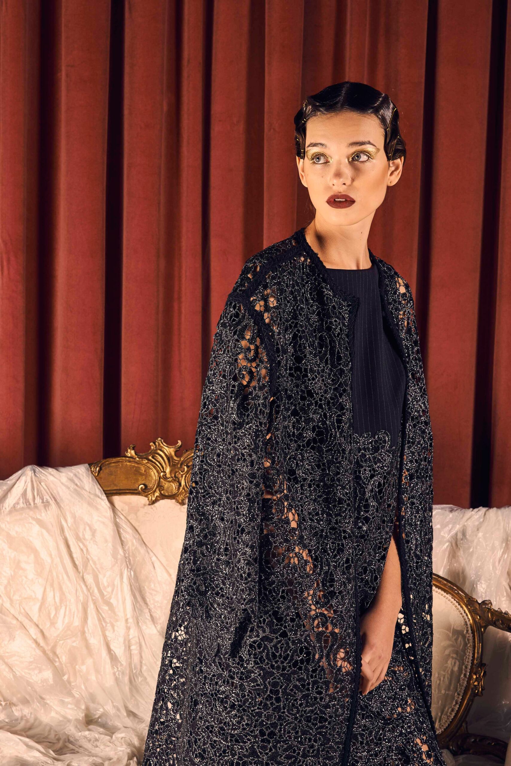 black lace cape and fitted dress