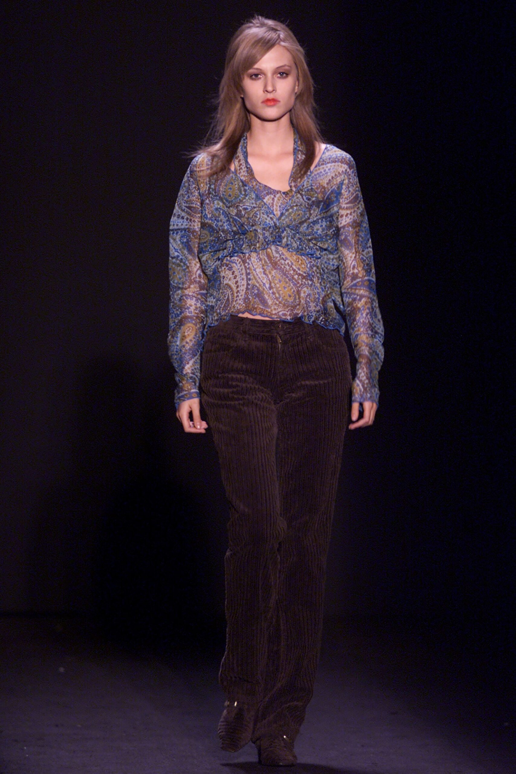 blue printed silk shirt with brown pants