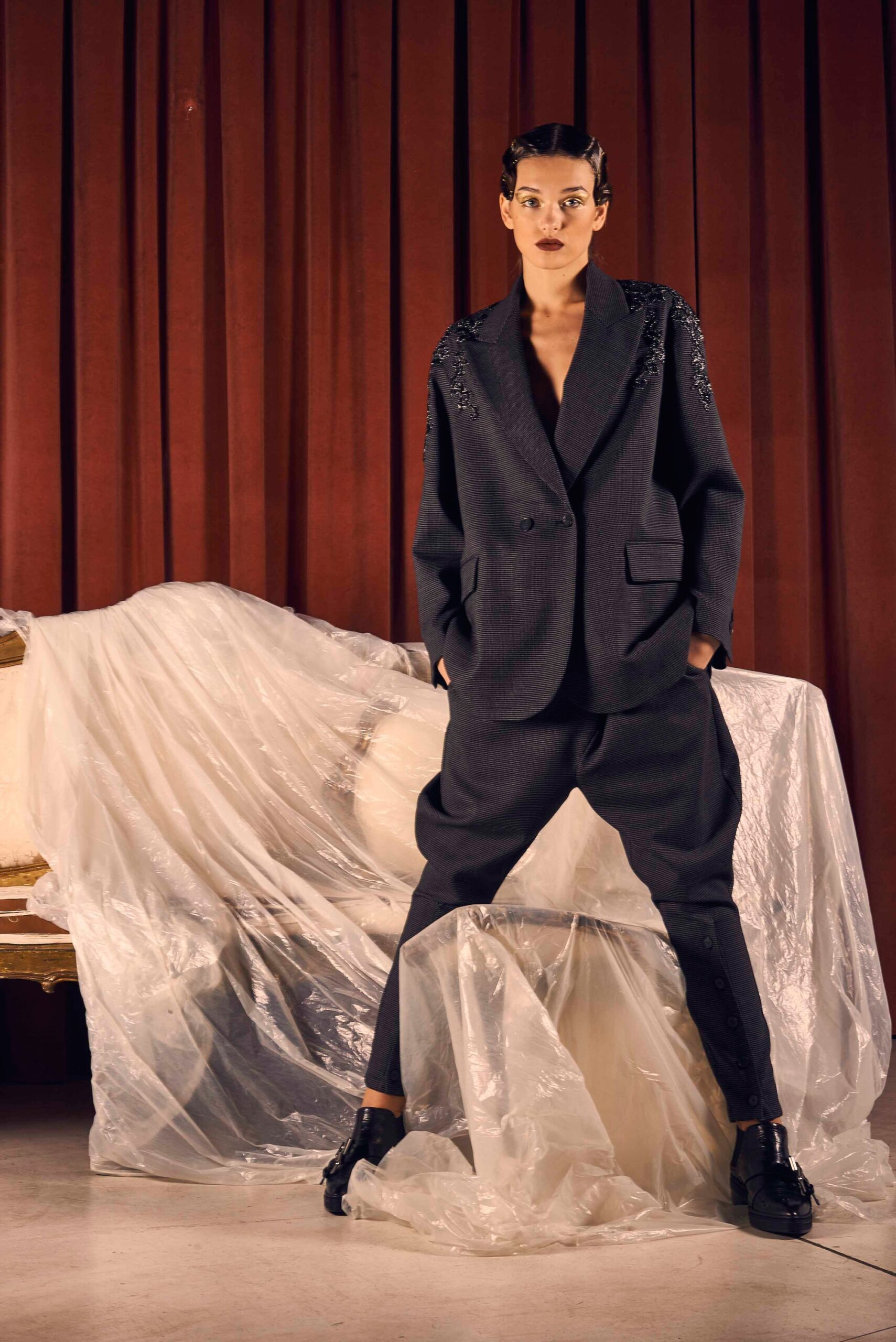 black tailored suit with relaxed pants
