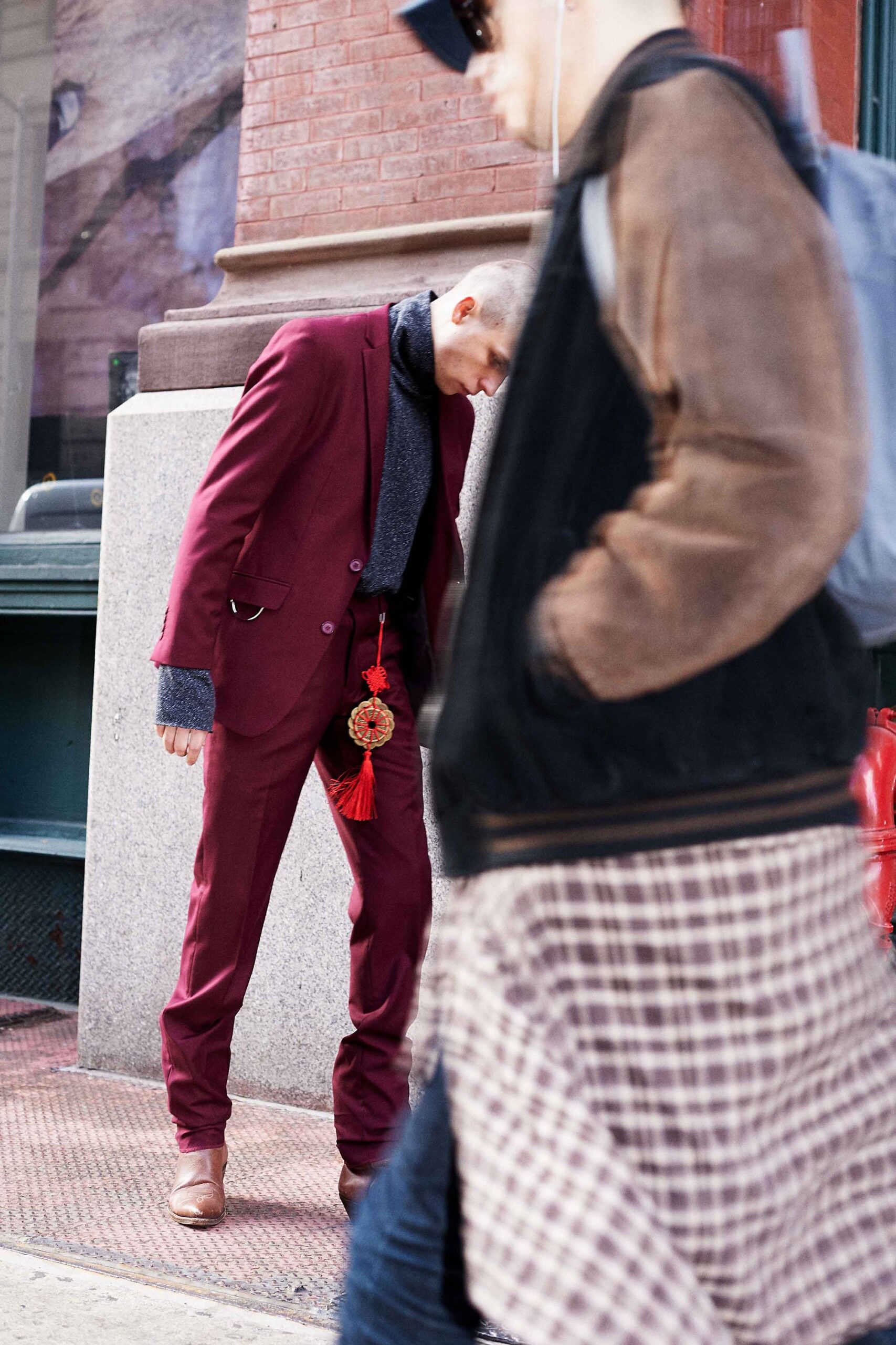 maroon tailored suit with gray shirt