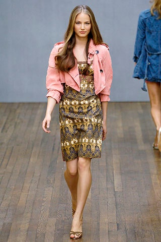 pink fitted jacket and gold dress
