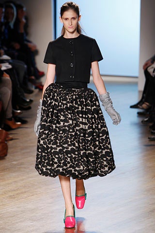black top and flared midi skirt