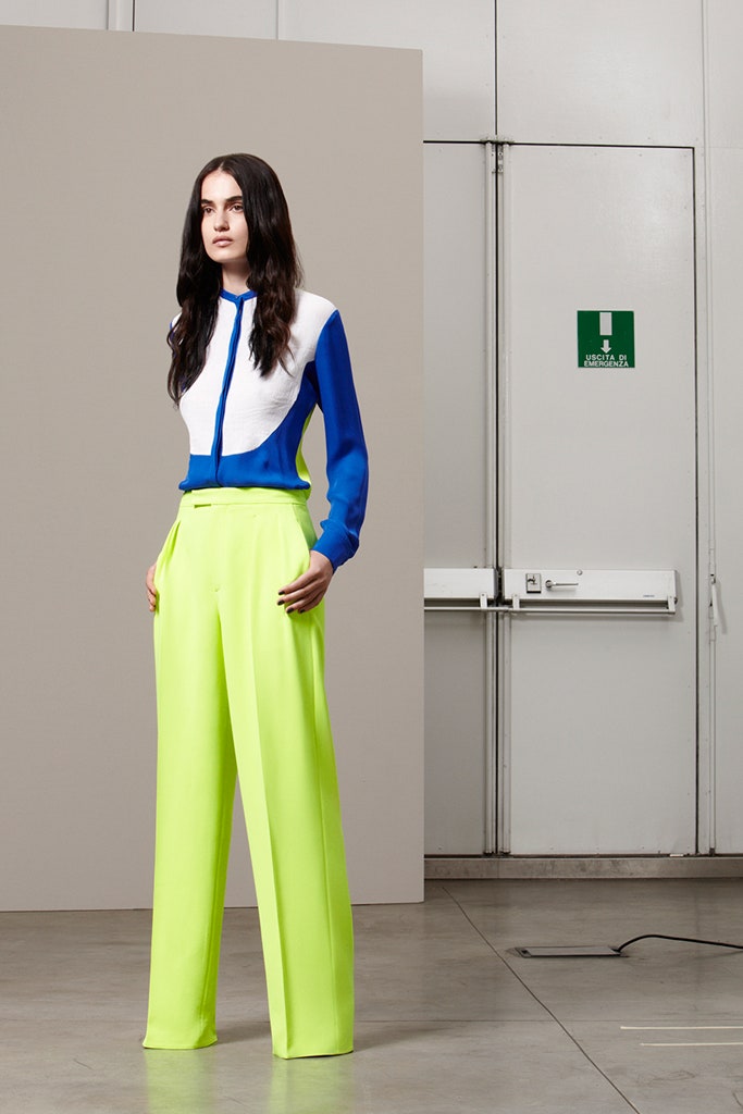 blue and white fitted shirt with neon green tailored pants