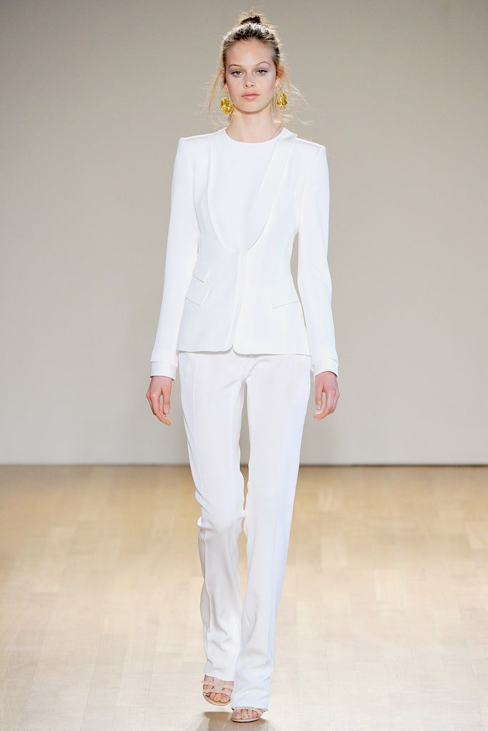 white tailored suit with strappy shoes