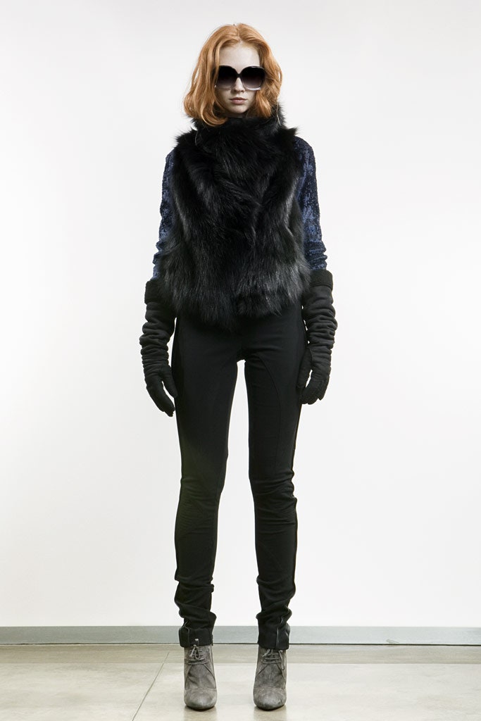 black faux-fur top with slim pants