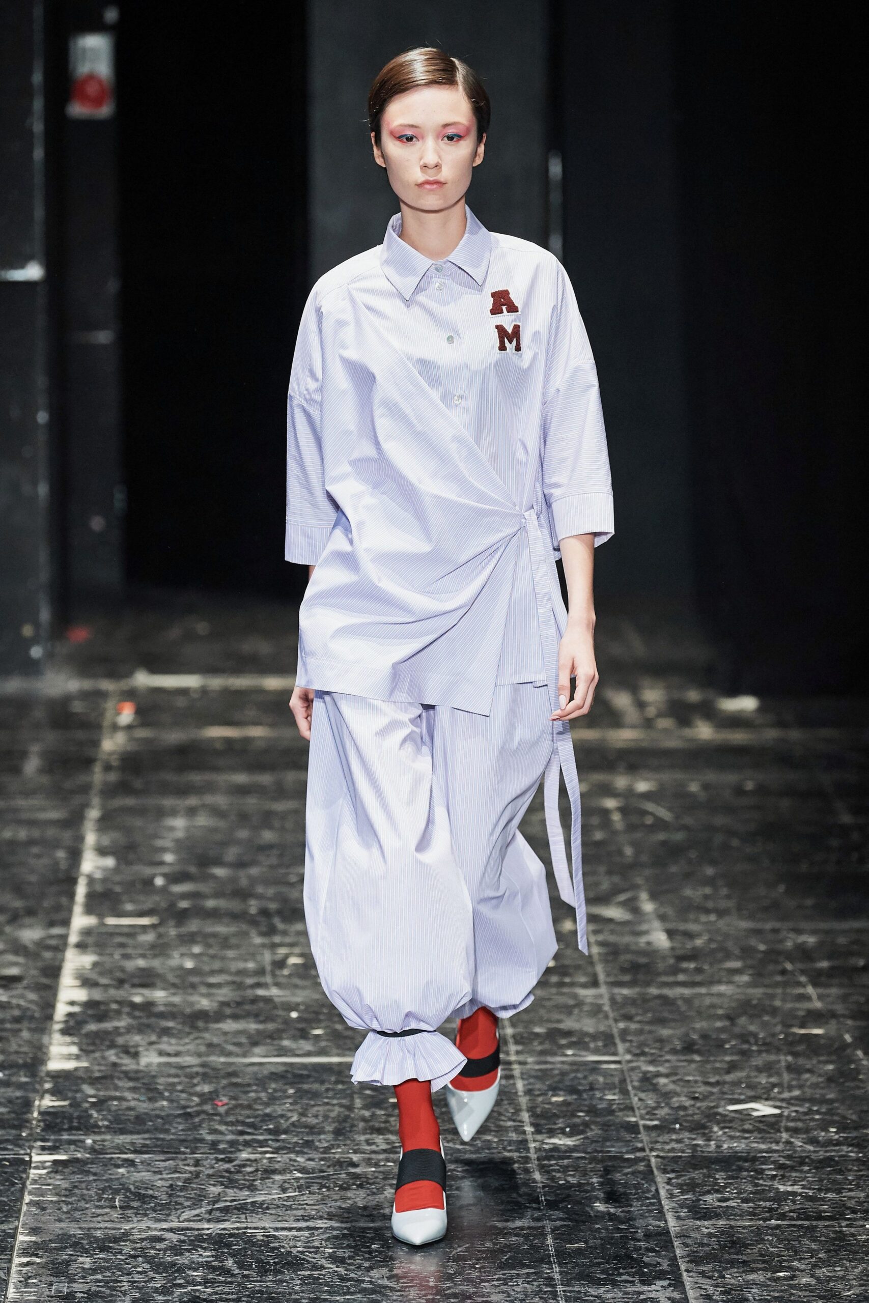 white cotton long-sleeve collared relaxed buttoned shirt