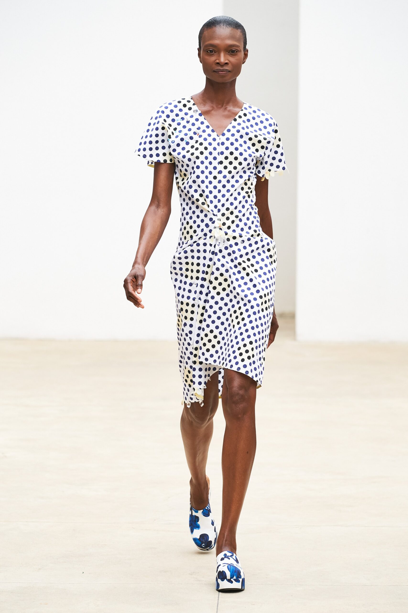 white and blue polka-dot dress