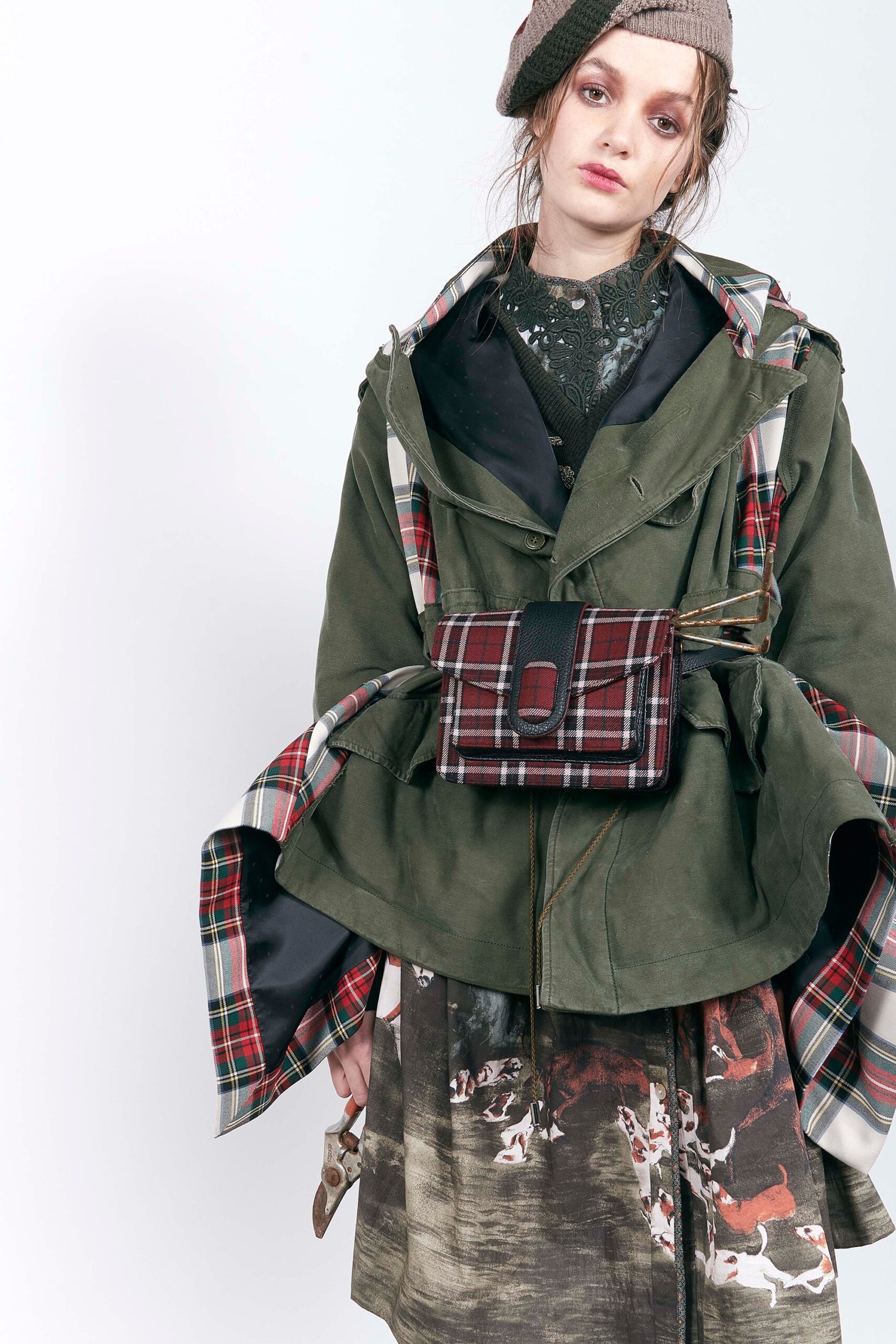 green layered jacket with black dress