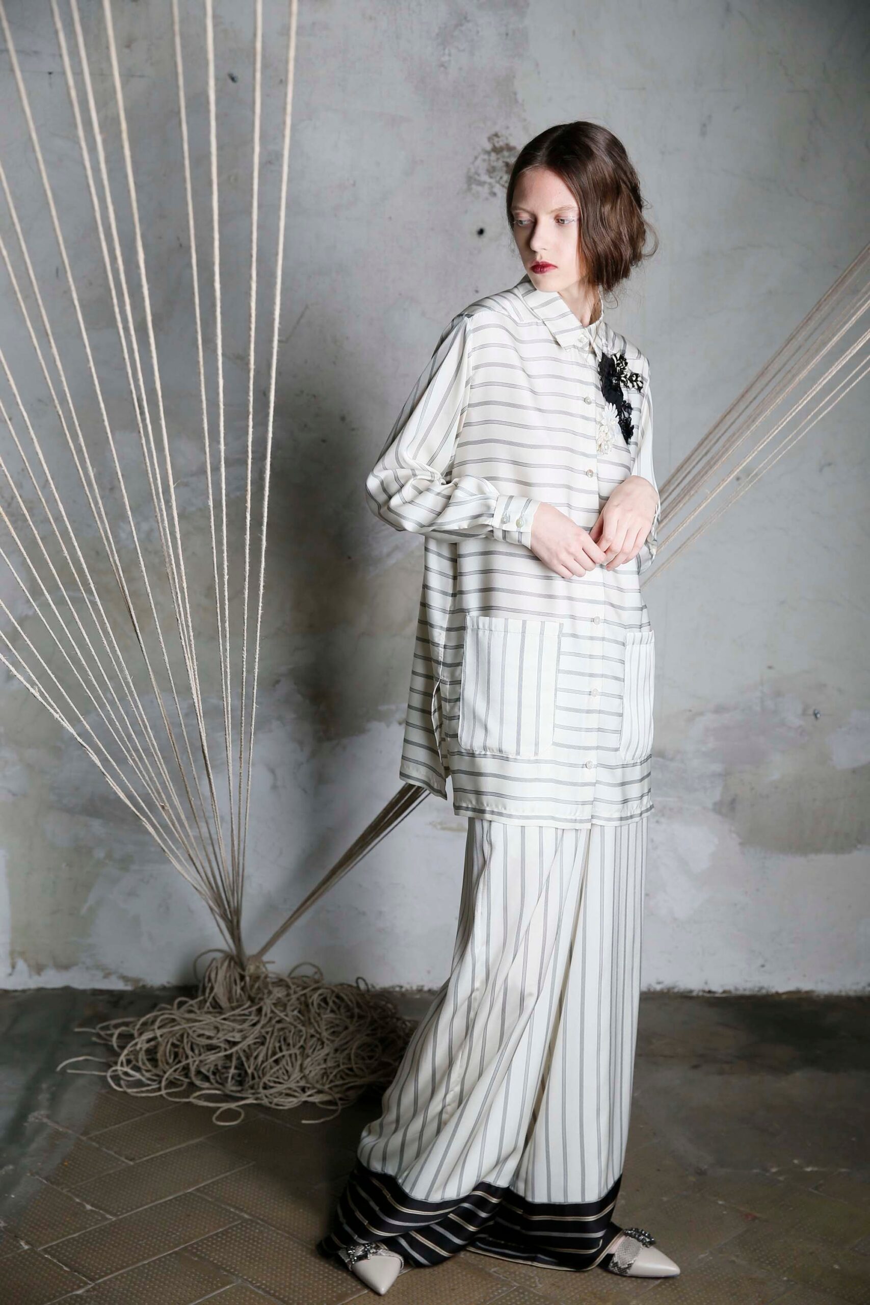 striped white and black shirt and pants
