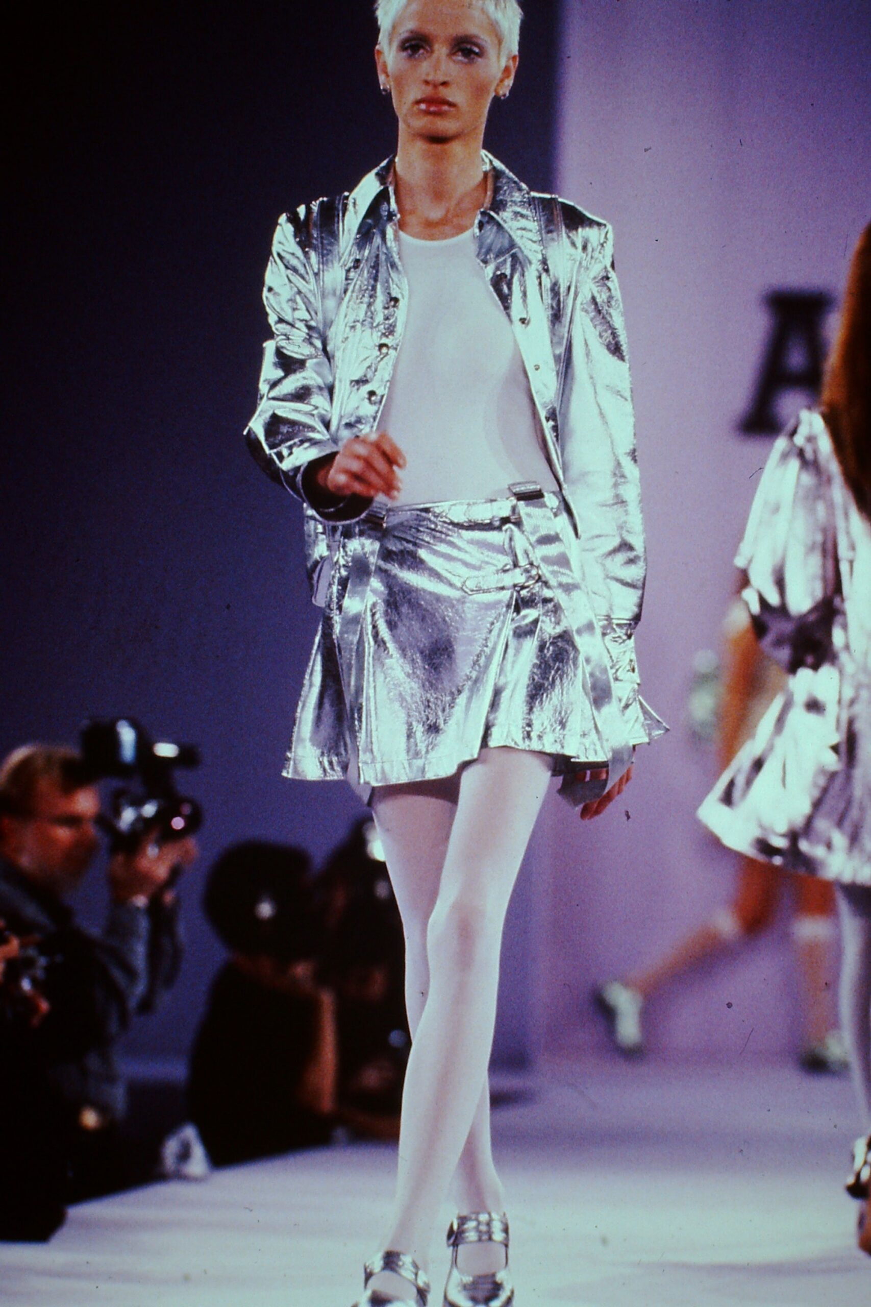 silver metallic jacket and mini skirt