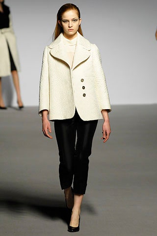 white wool long-sleeve collared structured buttoned coat