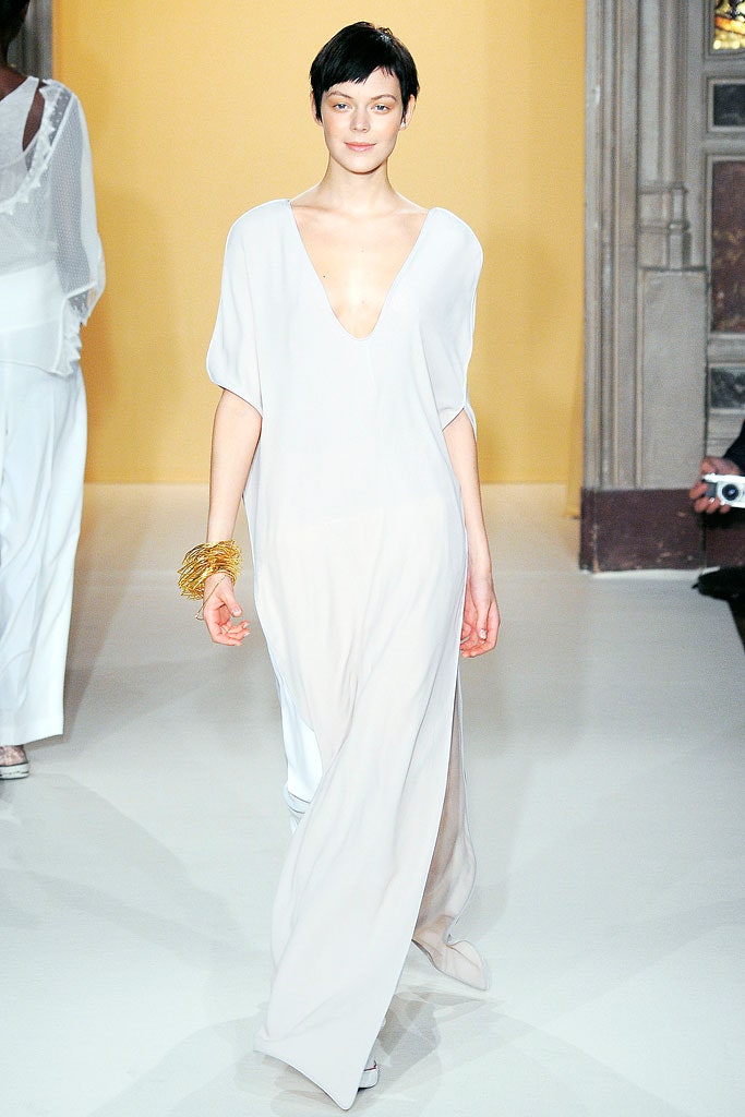 white flowing sleeveless gown