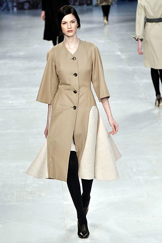 beige fitted coat with asymmetric hem