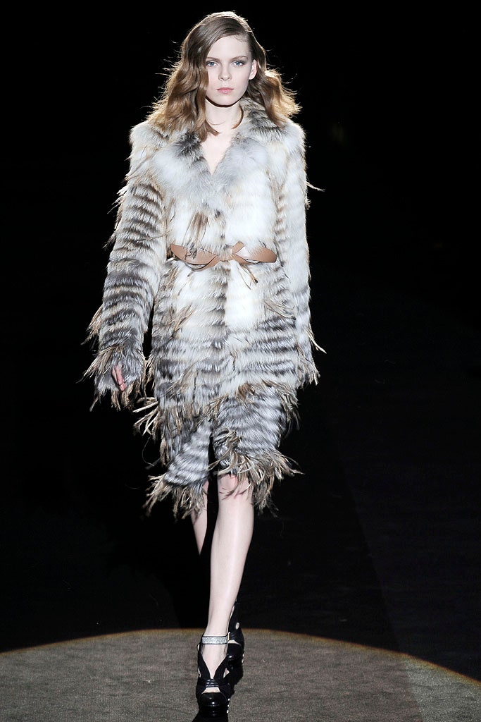 gray and white fringed fur coat