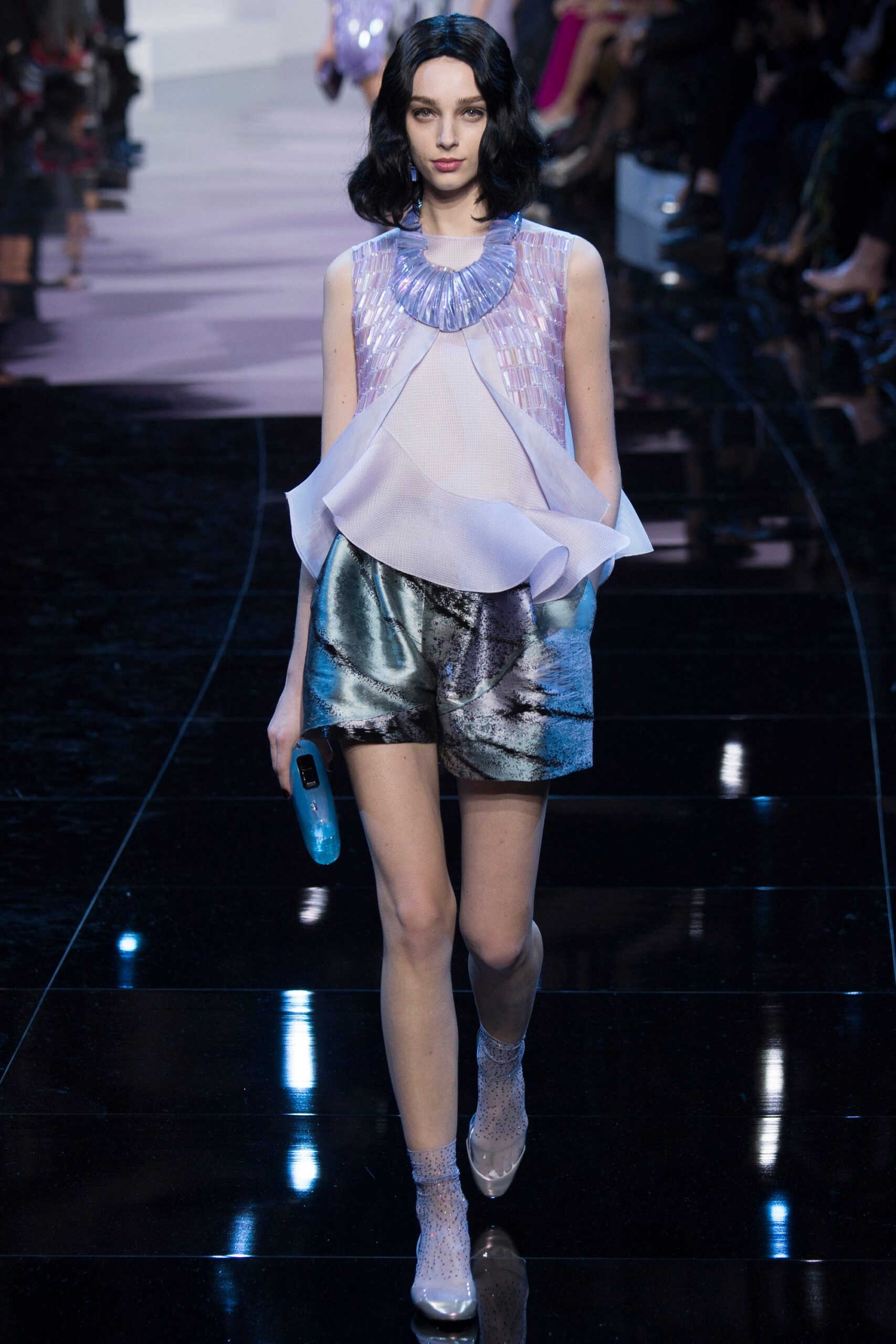 purple silk relaxed top with blue shorts