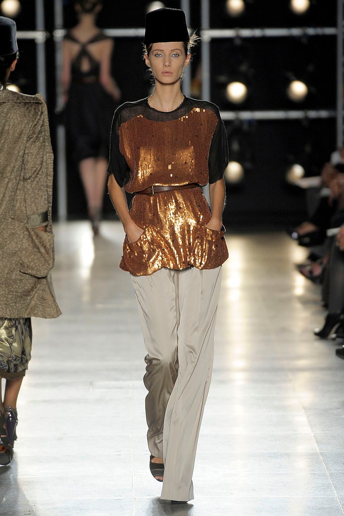 brown sequin top with beige pants