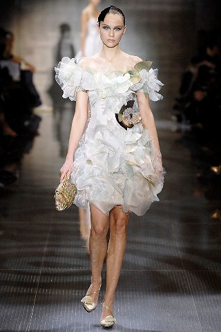 white silk sleeveless off-shoulder fitted ruffled layered dress