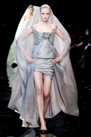 gray silk fitted dress with cape