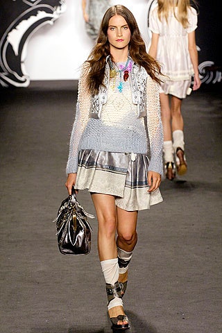 gray fitted top with silver mini skirt
