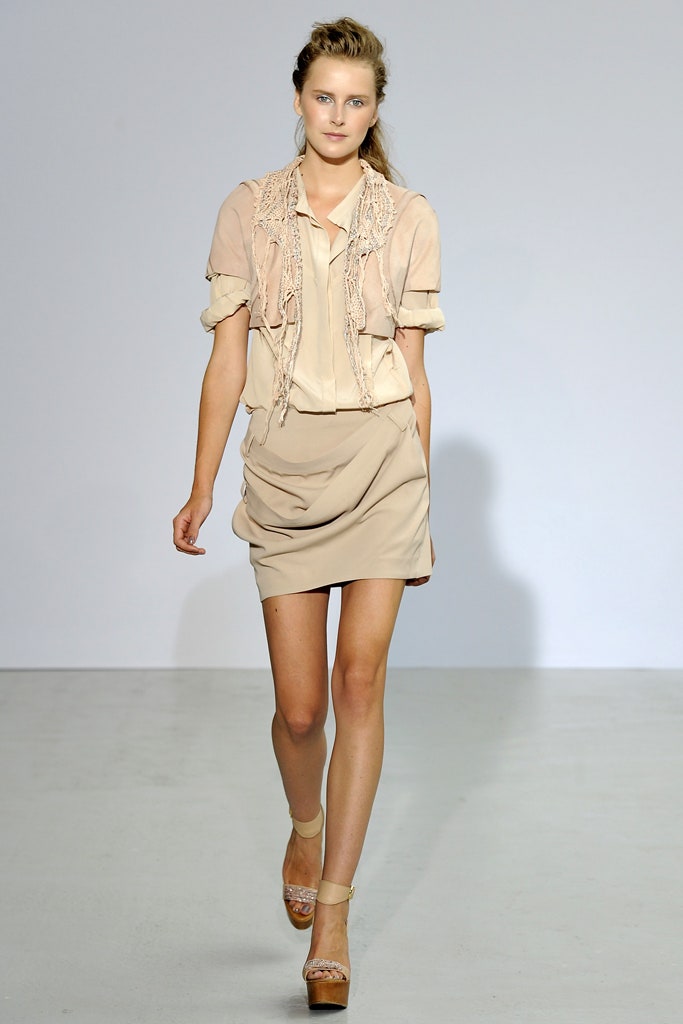 beige silk blouse and mini skirt