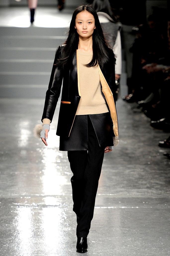 black leather blazer beige sweater