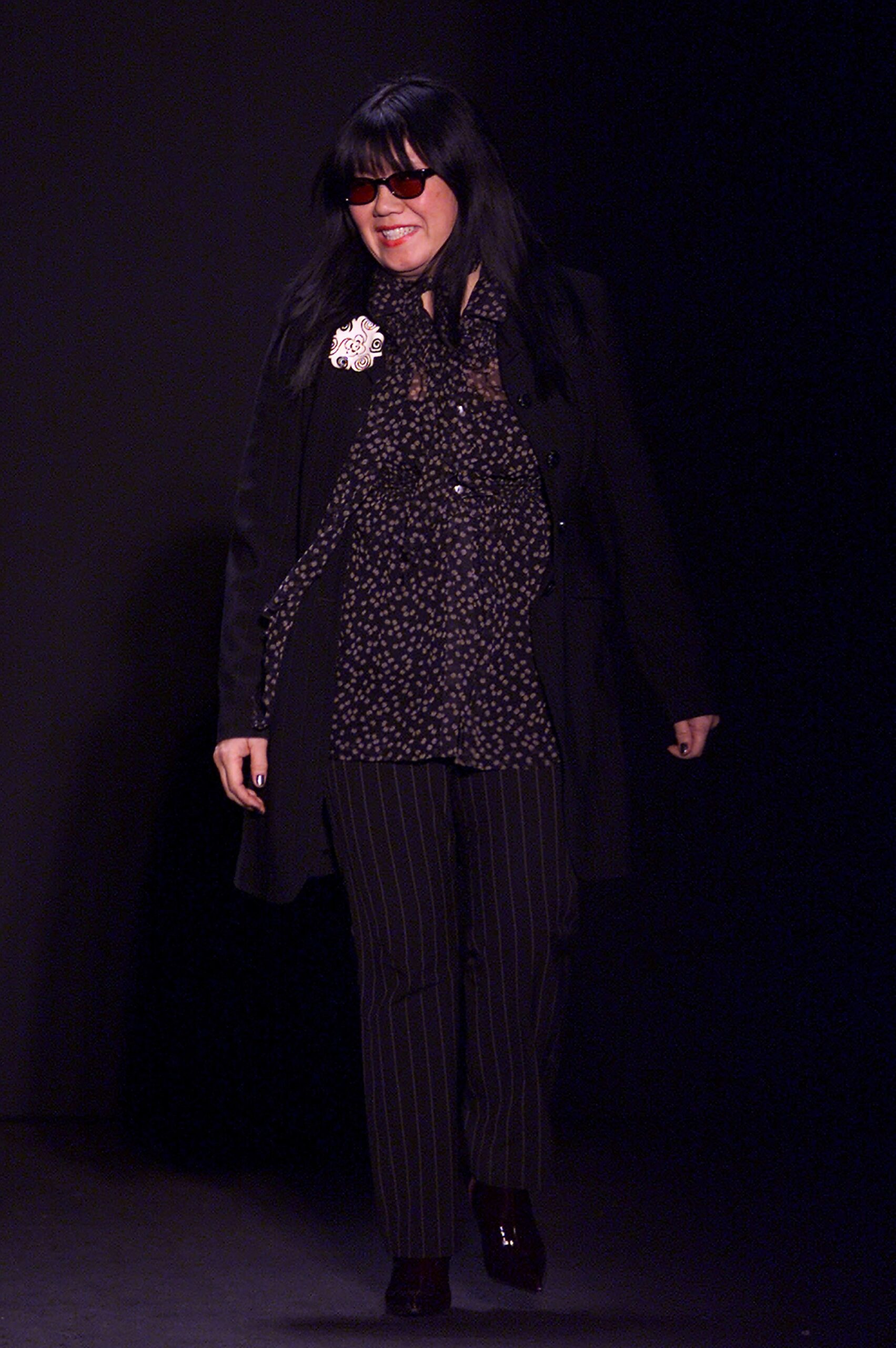 black coat and blouse outfit