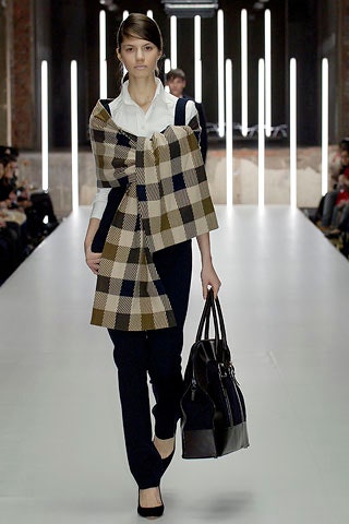 white blouse black pants checked cape