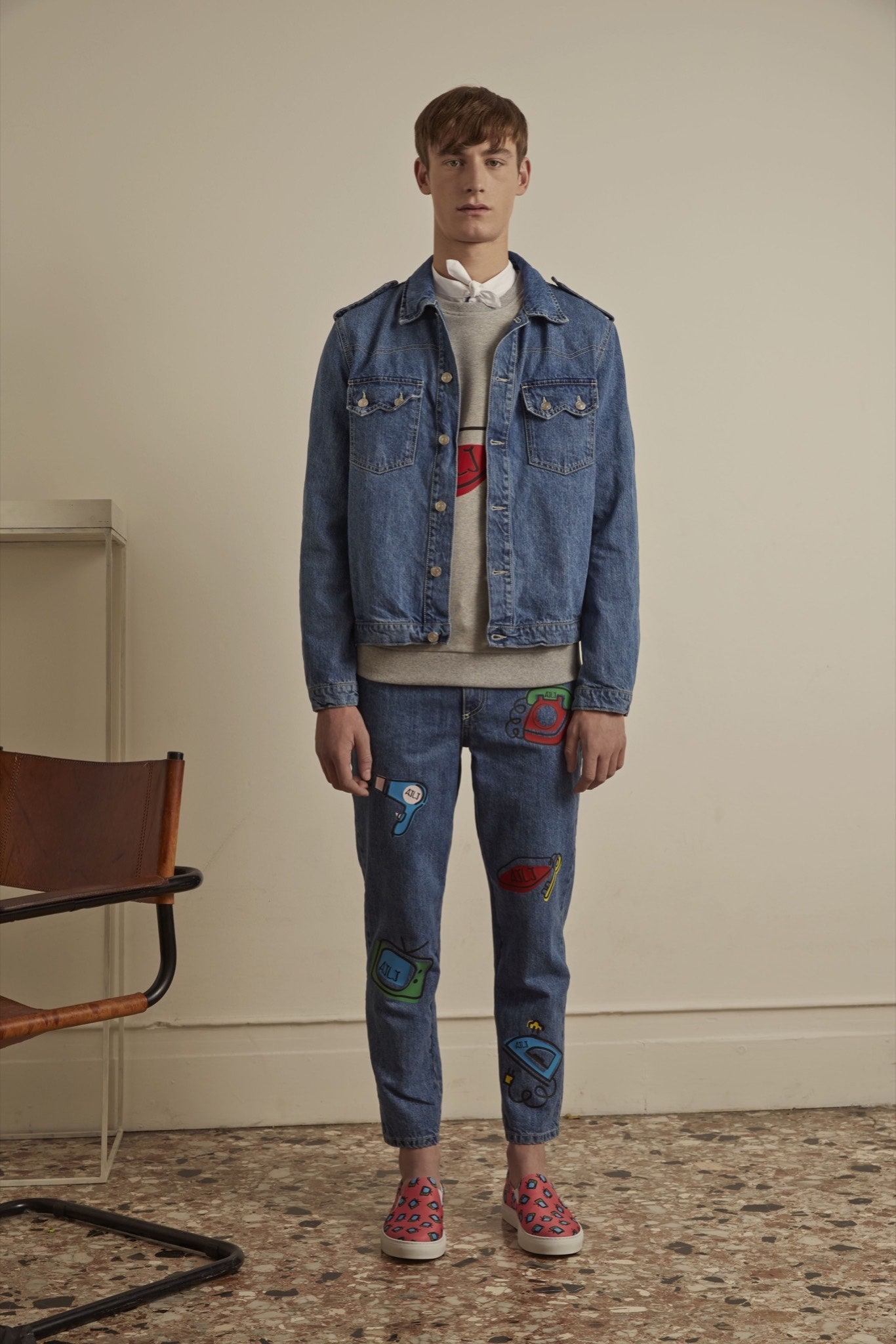 blue denim jacket with gray sweater