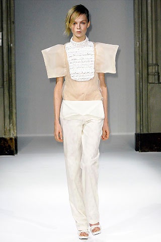white silk fitted top and relaxed pants