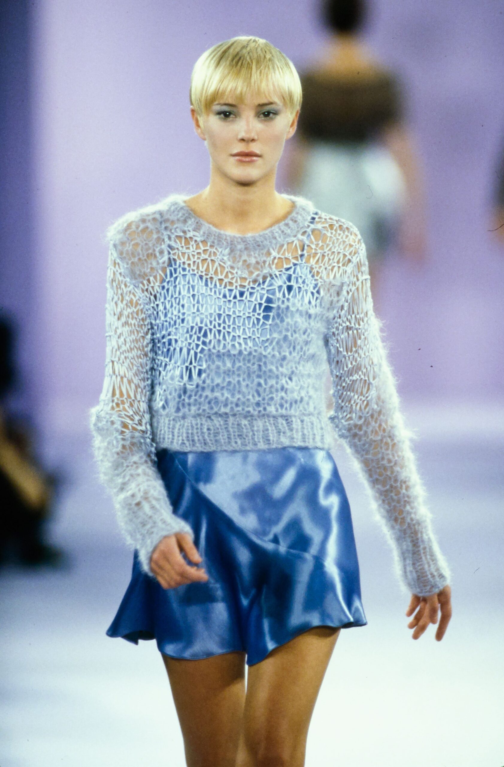 blue sheer sweater and mini skirt