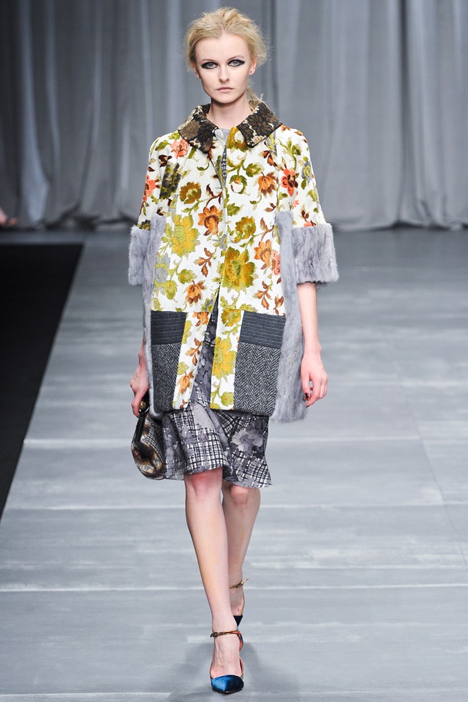 multi-colored floral coat with gray pencil skirt