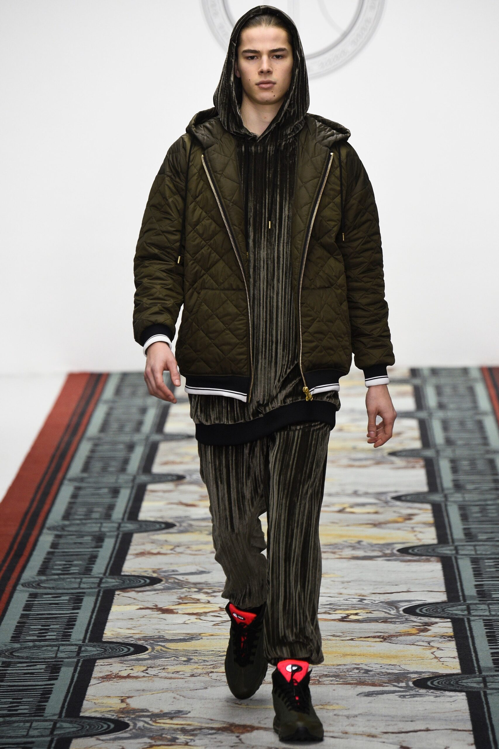 green quilted jacket with black velvet top and pants
